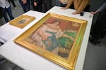 Recovered paintings "Portrait of Madame Colonna Romano", right, and "Young Woman at the Well," stolen from the Renoir Museum in Cagnes-sur-Mer are on display at the Interdisciplinary Centre for the Conservation and Restoration of Heritage in Marseille, France, Monday Oct. 12, 2026.