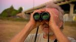 Jim Fairchild watches Vaux's swifts flying near a new birdhouse in Albany.