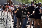 Pro-Trump and pro-police demonstrators clashed with anti-fascist counterprotesters on the 87th day of protests against police violence and systemic racism. Despite violence in the streets, police were notably absent and never declared an unlawful assembly. 