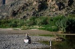 Joan Stutts Escamilla sits in silence by the edge of the Rio Grande near the iconic limestone cliffs of Santa Elena Canyon. “It’s such a god-given gift,” said Escamilla.
