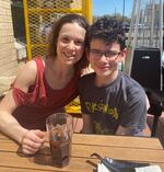 Robin Marie and her 13-year-old son Brennan pose for a photo earlier this spring at a restaurant in Texas. Marie was visiting her son who's living and attending school at an out-of-state residential treatment facility paid for by his local school district and the state. 