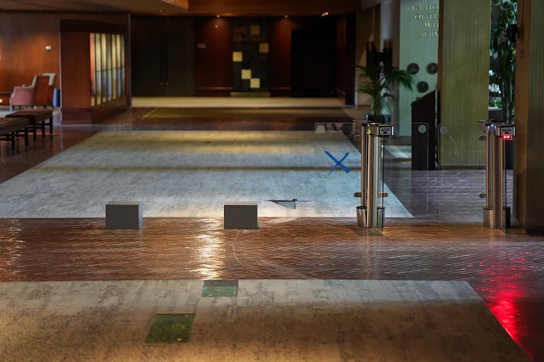 Glass gates are missing and the carpet is damaged from tires where former food and beverage employee Bruce Valentine Whitman crashed a rental car carrying several pipe bombs into the Multnomah Athletic Club in Portland, Ore., on May 5, 2026.