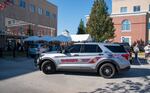 A sheriff's patrol car in Paulding County, Georgia is parked in front of an early voting location