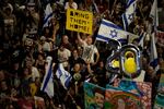 People protest against Israeli Prime Minister Benjamin Netanyahu's government and call for the release of hostages held in the Gaza Strip by the Hamas militant group, in Tel Aviv, Israel, Saturday, June 22, 2024.