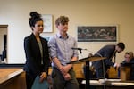 Tristen Edwards stands with a client during a hearing at Multnomah County Courthouse in Portland, Ore., Friday, May 17, 2019. Edwards is a public defender who works on misdemeanor cases at the nonprofit Metropolitan Public Defenders.