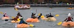 People compete in the 2017 West Coast Giant Pumpkin Regatta.