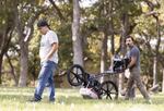 Shane Turntoes-Kuhnhenn, right, and Jon Olney Shellenberger search an area where Native American boarding school dormitories used to be with ground-penetrating radar at Mool-Mool, or Fort Simcoe Historical State Park, in White Swan, Wash.