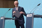 German Chancellor and leader of Germany's Christian Democratic Union (CDU) Friedrich Merz leaves at the end of a press conference one day after state elections in Berlin and Mecklenburg-Western Pomerania, at the CDU's headquarters in Berlin on Sept. 21.