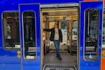 Marty Valentine, pictured on TriMet MAX Blue Line on Nov. 8, 2025, is a middle school math teacher in Wilsonville. And the first person to set the world record for "speedrunning" the MAX light rail system.