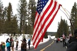 Dozens of people flocked to a roadside memorial at the scene where occupation spokesperson LaVoy Finicum was killed in an altercation with law enforcement officials.