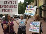 Protestors march through downtown Portland against Arctic drilling.