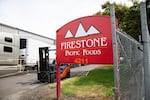 The sign outside FIrestone Pacific Foods pictured on June 8, 2020. The company had one of the largest outbreaks in the Portland metropolitan area in mid-May.