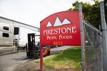 The sign outside FIrestone Pacific Foods pictured on June 8, 2020. The company had one of the largest outbreaks in the Portland metropolitan area in mid-May.