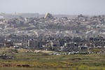 A view over ruined buildings in the northern Gaza Strip as seen from a position on the Israeli side of the border on April 2, southern Israel. Defense Minister Israel Katz has said Israel will "capture extensive territory" to be added to "buffer zones" in the Gaza Strip after the military expanded its ground assault.