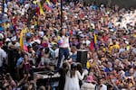 Opposition leader Maria Corina Machado stands before supporters during a protest against President Nicolas Maduro the day before his inauguration for a third term, in Caracas, Venezuela, Thursday, Jan. 9, 2025. (AP Photo/Ariana Cubillos)