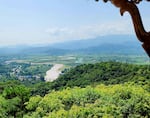The Kok River and its valley, seen from the Wat Tha Ton Temple.