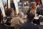 Tamastslikt Cultural Institute director Bobbie Conner distributes signing paperwork during a ceremony commemorating the transfer of the Fred L. Mitchell & Family Collection to the Confederated Tribes of the Umatilla Indian Reservation at the Nixyaawii Governance Center in Mission, Ore., March 31, 2026.