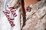 Cordeiro wears a vintage Arkansas Razorbacks hog necklace made by D. Burke Design.