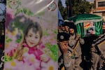 Scouts and relatives of Amal Hassan al-Durr carry her coffin to the cemetery on Feb. 22.