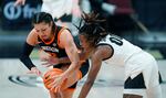 Oregon State guard Talia von Oelhoffen, left, fights for control of the ball with Colorado guard Jaylyn Sherrod, right, in the second half of an NCAA college basketball game Sunday, Feb. 11, 2024, in Boulder, Colo.