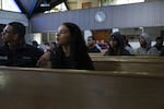 Students from Roosevelt and Jefferson High Schools listen to the Camas High School Men's Choir perform Seven Last Words on April 26, 2019, at the Bethel AME Church in North Portland, Ore. 