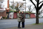From left, Kelly Ma, who relies on Chinese language interpretation to understand and be involved in her son’s education and Individualized Education Program (IEP) plan, and former Portland Public Schools Chinese language specialist Yvonne Liao, pose for a portrait on 82nd Avenue in Portland, Ore., on Dec. 2, 2025.