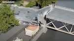 Screenshot from a November 2021 Multnomah County video show a simulation of the Burnside Bridge in Portland collapsing during an earthquake. The county has identified some cost savings refinements to the original plan to earthquake ready the bridge and request feedback from the public.