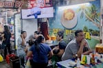 A commercial of Nayib Bukele as part of his political campaign is seen on the television in the Mercado Central in San Salvador on Jan. 31.