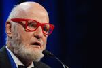 FILE - Author Lawrence Ferlinghetti recites a poem after he was awarded the Literarian Award for Outstanding Service to the American Literary Community at the National Book Awards in New York, on Nov. 16, 2005. Ferlinghetti, a poet, publisher and bookseller has died in San Francisco at age 101. His son says Ferlinghetti died at home on Monday, Feb. 22, 2021. Ferlinghetti helped launch and perpetuate the Beat movement. He was known for his City Lights bookstore in San Francisco, an essential meeting place for the Beats and other bohemians in the 1950s and beyond. (AP Photo/Henny Ray Abrams, File)