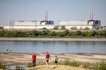 A view of Hungary’s Paks Nuclear Power Plant from the Danube embankment in Dunaszentbenedek on July 31, 2026. Record-low water levels on the Danube, driven by extreme heat and drought, have threatened the plant’s cooling system and highlighted Europe’s worsening climate crisis.