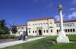 Students walk across Eastern Oregon University campus near the administration building in LaGrande, Oregon, in this 2003 file photo. The university will soon begin planning its next steps in replacing its president, Tom Insko, who is leaving to take a timber industry job in Wilsonville.