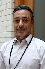 Portland Security Manager Manny Guerra stands for a portrait at Portland City Hall on August 18, 2026.