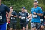 Andres Lopez competes in the Portland Marathon in Portland, Ore., Sunday, Oct. 6, 2019. The marathon's new route traveled through the Sellwood neighborhood.