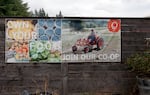 An Our Table Cooperative banner promoting locally-grown produce at the Sherwood, Ore., farm, Sept. 12, 2024.