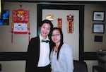 Wanna Lei, left, wears a uniform as a receptionist while posing with her work friend, Wendy Wen, at Legin Restaurant in Portland, Ore., in 2007.