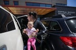 Alyssa Bennett loads her daughter Pamela into the car after picking her up from daycare at the Children's Learning Center at Central Oregon Community College in Madras, Ore., on June 4, 2026.