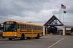 A school bus leaves Mark Morris High School in Longview, Wash., on March 3, 2026.
