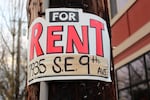 A 'For Rent' flyer is stapled to a utilities pole in southeast Portland, Ore., on Thursday, Dec. 9, 2021