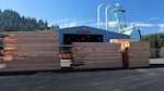 Pallets of lumber sit outside of a building at Starfire Lumber in Cottage Grove on Feb. 5, 2026. Wood production is among the manufacturing industries to lose employment in recent years.