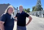 Elk Island Operations Manager Bernie Woodard, left, and MINT Board President Scott Nelson at Parker's Place Village. Shown on July 1, 2026.
