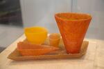 "Composition of Orange" by Deborah Horrell is made with "pâte de verre" kiln-formed glass.
