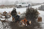 A new militant from Arkansas guards the entrance to the occupied refuge on Jan. 14.