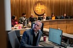 Portland Mayor Keith Wilson studies a presentation on a controversial budget proposal during a Portland City Council meeting at Portland City Hall on Nov. 12, 2025, in Portland, Ore. 