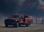 This photo provided by Umatilla Fire District No. 1 shows a fire truck near the Cold Springs Fire on July 2, 2025