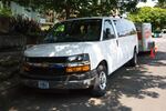 A passenger van in front of the shuttered Sunnyside Sprouts day care in Portland.