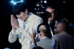 Yang Hansen reacts after being selected 16th by the Memphis Grizzlies in the first round of the NBA basketball draft, Wednesday, June 25, 2025, in New York.
