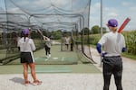 San Francisco Firebells players at batting practice at the University of Illinois - Springfield training field during preseason before the inaugural weekend of the Women's Pro Baseball League. Springfield, IL, July 30, 2026.