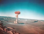 A sub-surface atomic test is shown March 23, 1955 at the Nevada Test Site near Yucca Flats, Nev.