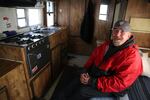 George Discuillo keeps warm in his RV right outside of Sisters, Ore.