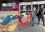 Sonya Daw and two other members of the Allison Street Climate Club dropping off electronics at Staples.